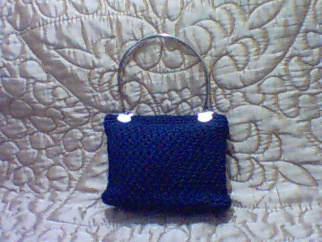 cartera clasica con asa