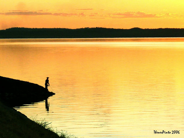 POR DO SOL NO LAGO DE PALMAS 