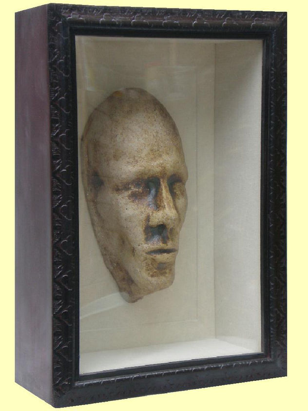 "Rostro de barro quemado II"