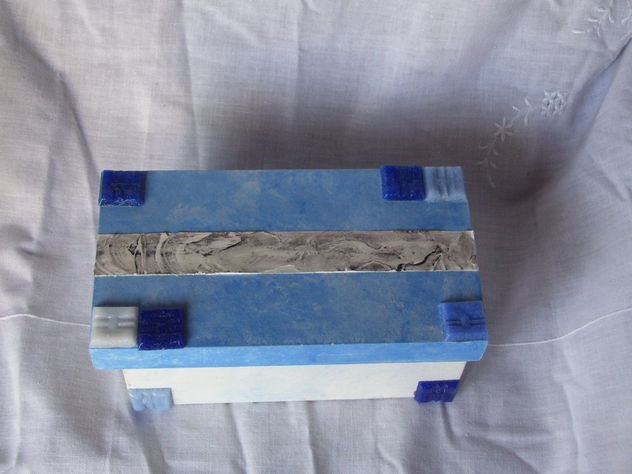 Caja de madera con venezitas