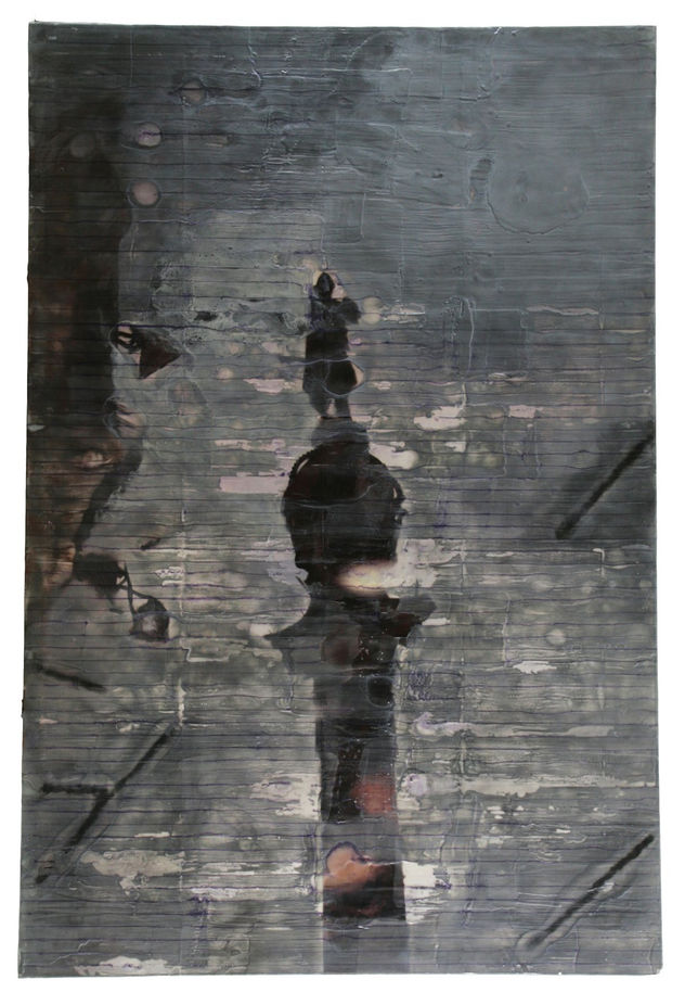"Colón reflejado en charco de agua"