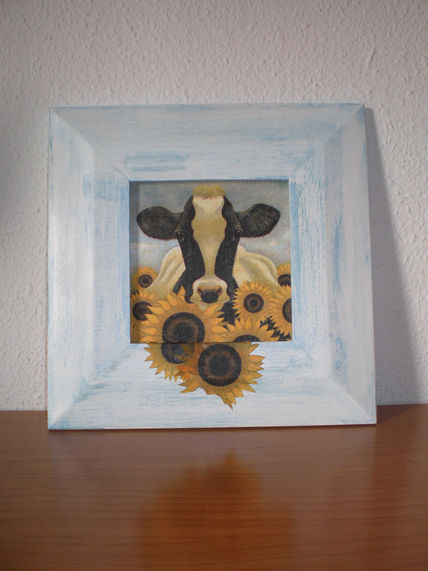 Vacha en los girasoles