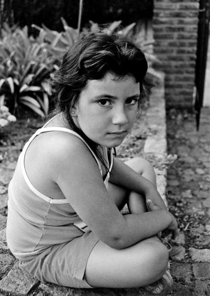 Sentada, espero