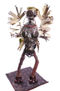 extraña figura de adoración pagana