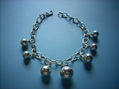 pulsera bolas colgantes