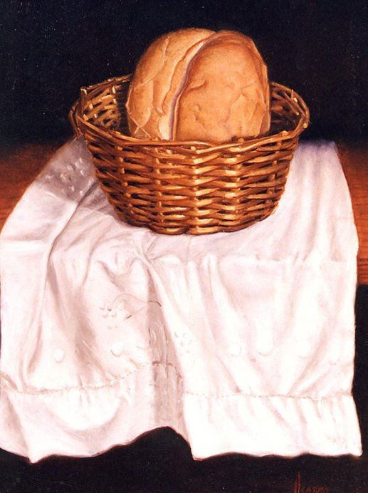 Cesta y Pan sobre mantel