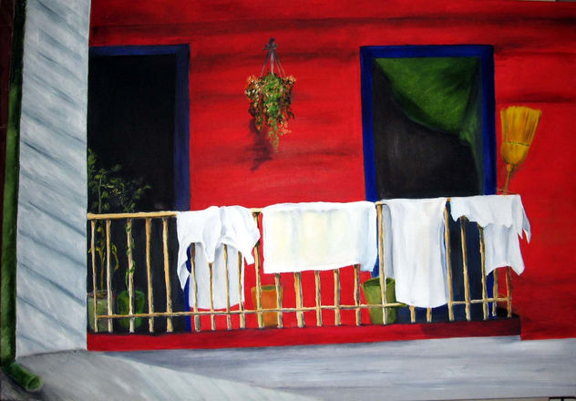 Balcon con ropa y escoba
