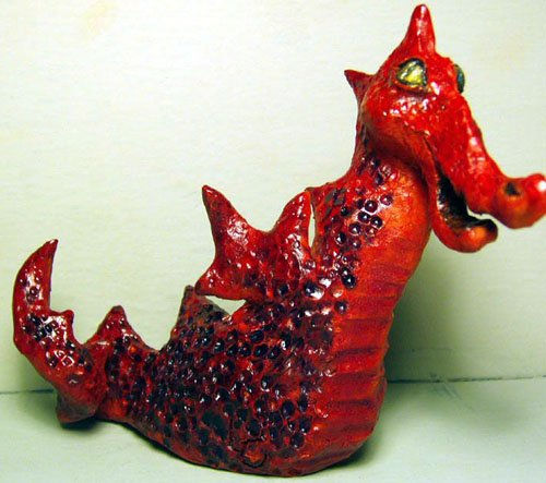 Dragón alado rojo 