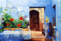 Geraneos en patio azul