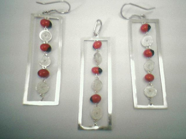 Set de aretes y dije con semilla