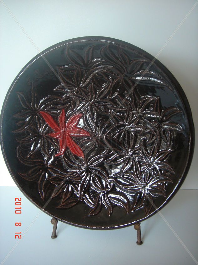 PLATO DE GREDA TALLADO 1