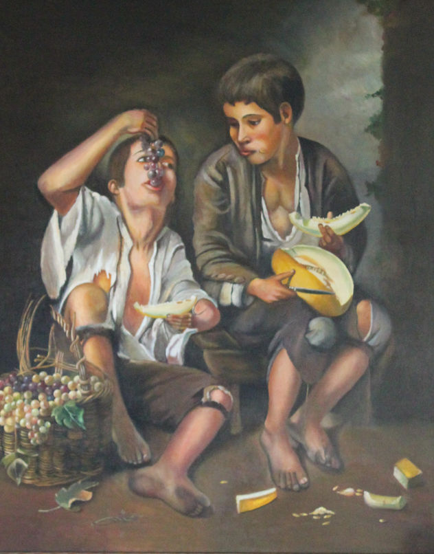 niños comiendo melón