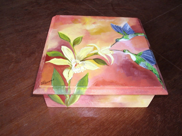 picaflor y orquideas
