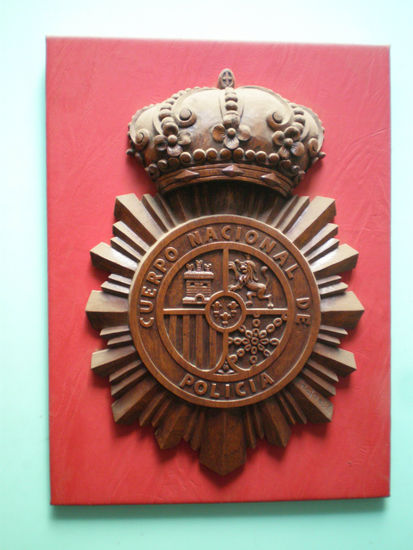 Escudo del C. N. de P. Talla Figurativa