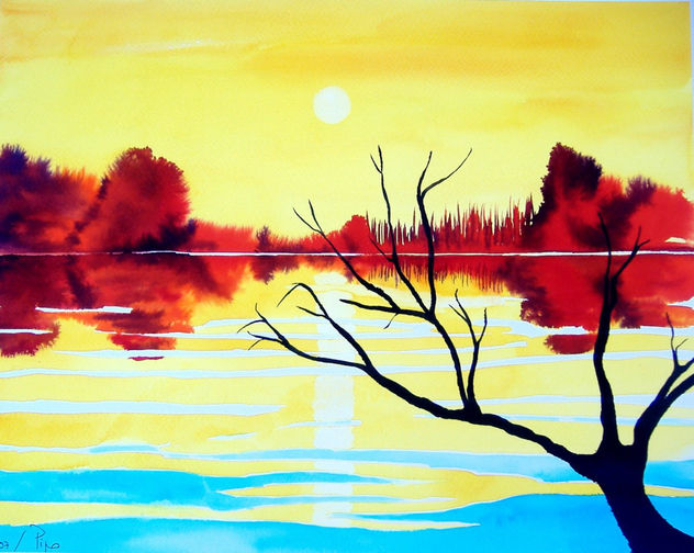 laguna con arbol seco