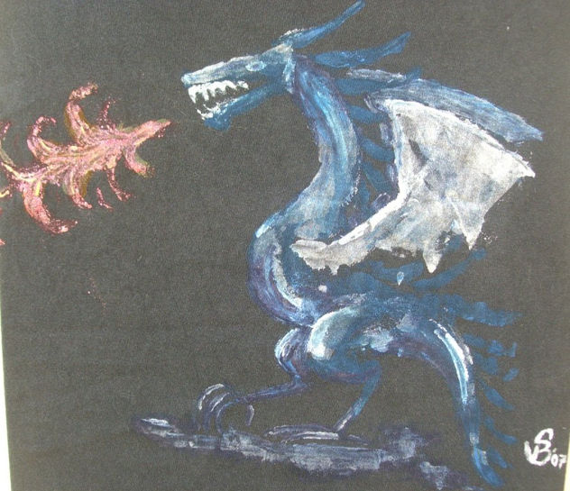 Dragón escupe fuego.
