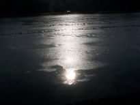 Sol sobre lago