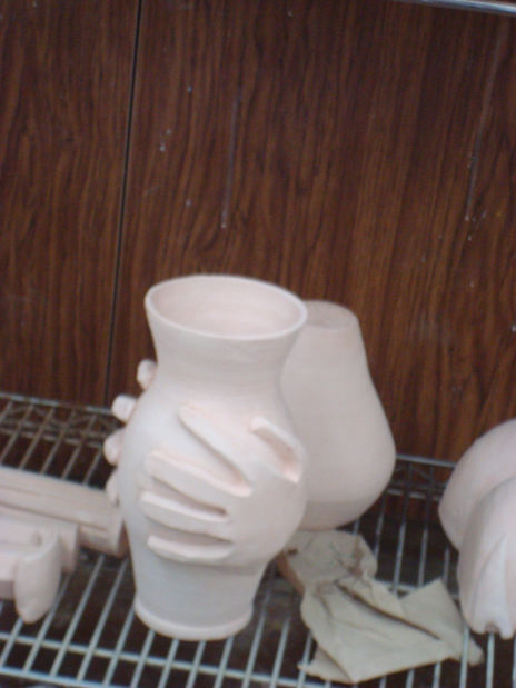 Manos  en vase