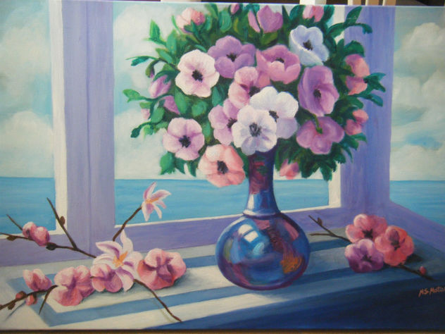 FLORES EN LA VENTANA