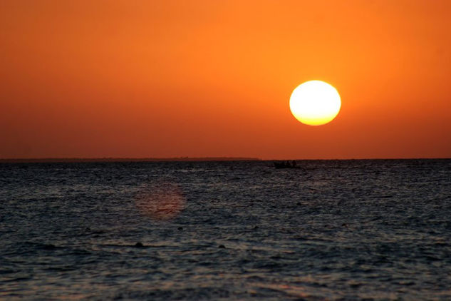 Isla, Pescadores y sol 