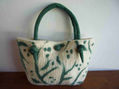 Cartera de fieltro amasado