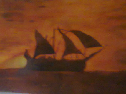 Velero a la tardecer
