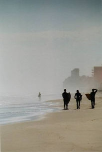 Surfers en la Playa