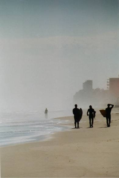 Surfers en la Playa