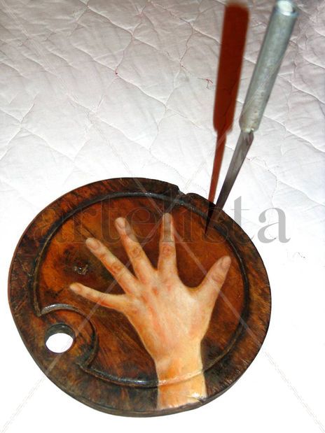 Mano con cuchillo...