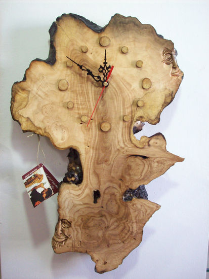 Reloj de olivo2. Wood Figurative