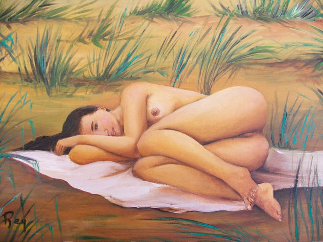 desnuda en la arena