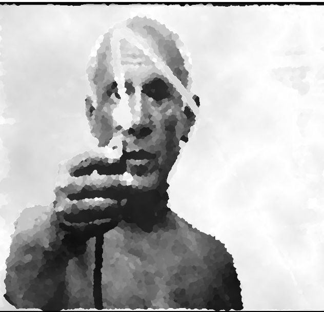 Picasso uses a flashlight to begin making a light drawing in the air