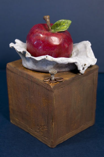 Manzana sobre Caja 