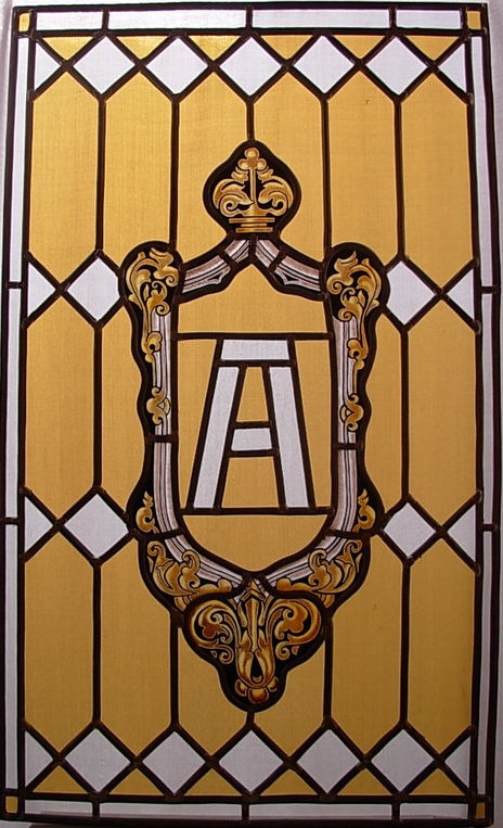 Escudo con inicial