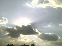 Cielo anubes y sol