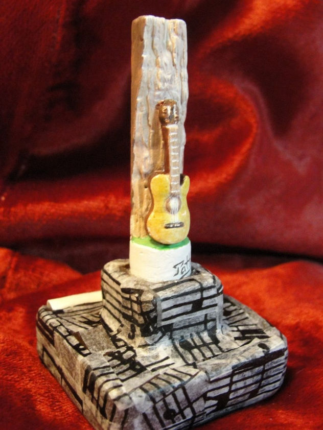 GUITARRA EN TRONCO