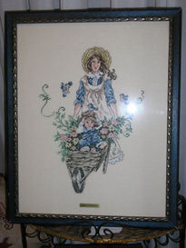 Niña con carretilla