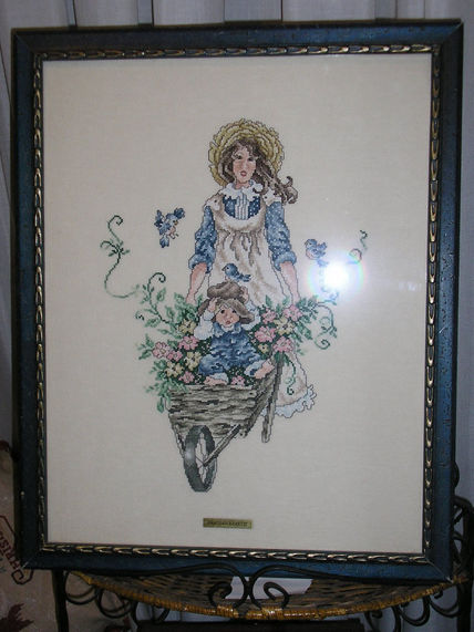 Niña con carretilla
