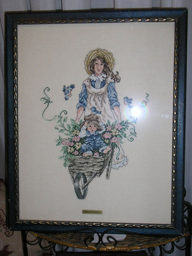 Niña con carretilla