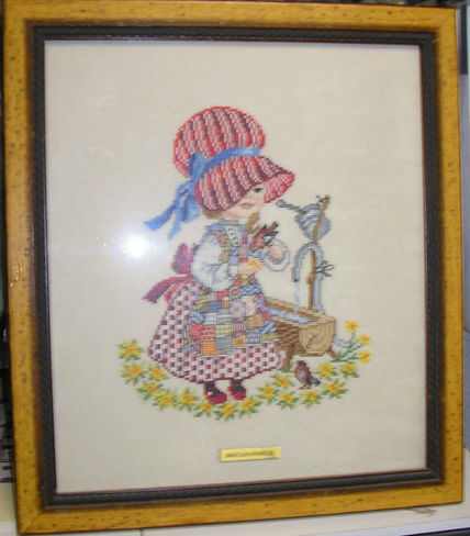 Niña con pajarito
