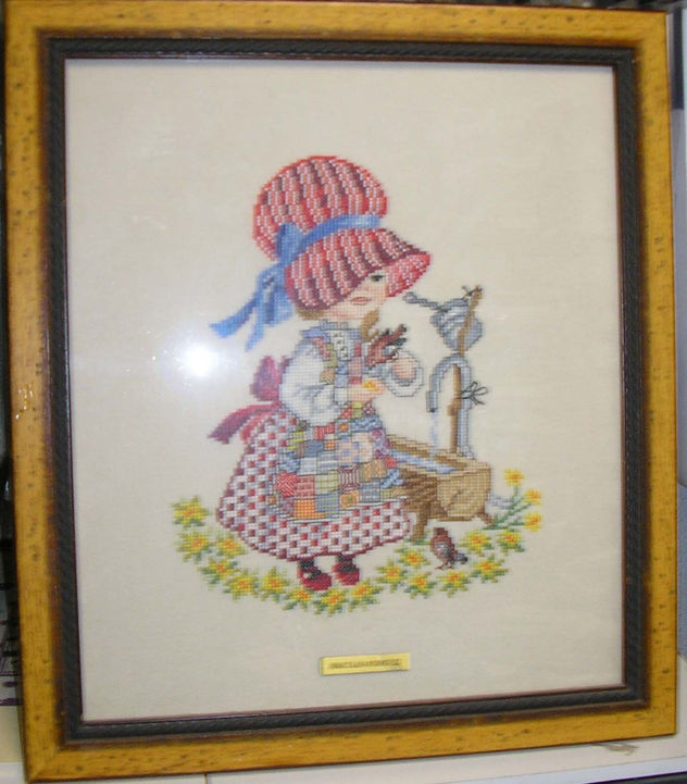 Niña con pajarito