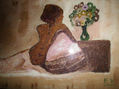 mujer recostada en la cama