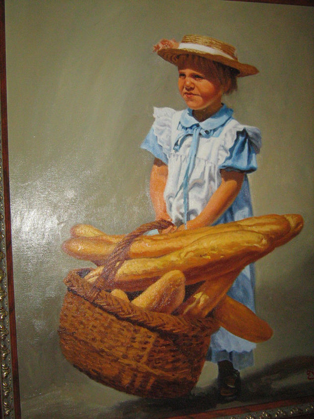 NIÑA CON CESTA DE PAN