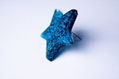 Prendedor Estrella+ flmnts azul aguamarina