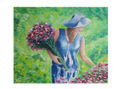 Mujer recogiendo flores