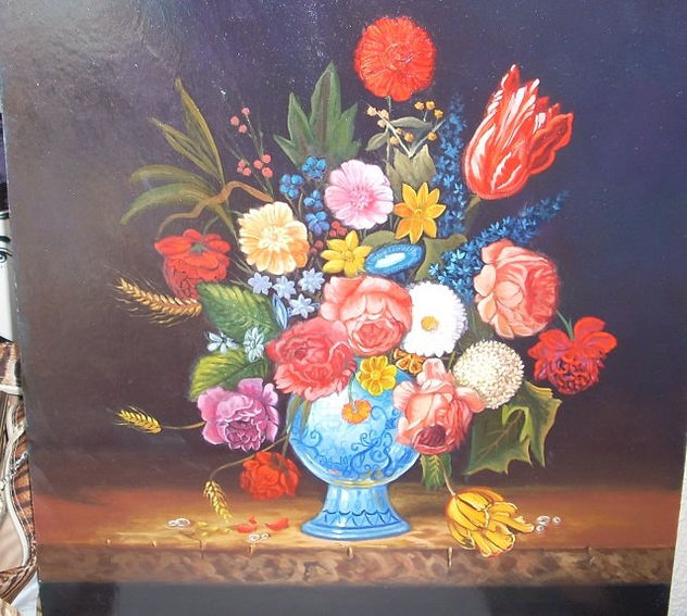 flores en jarron azul