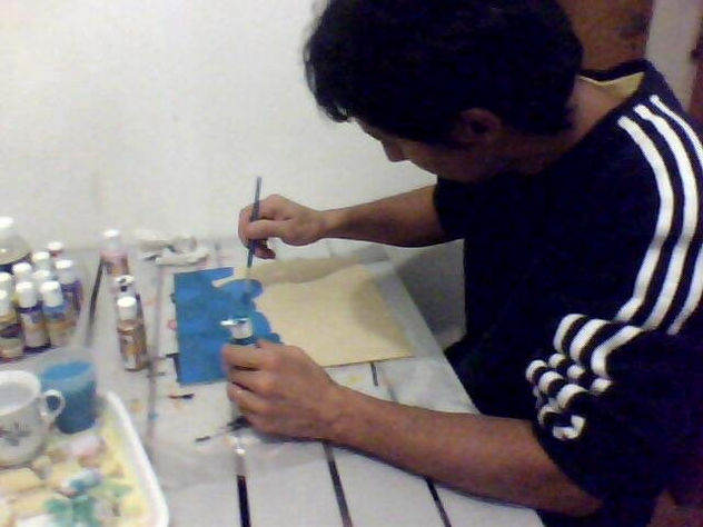 Alejandro pintando dia de lluvia