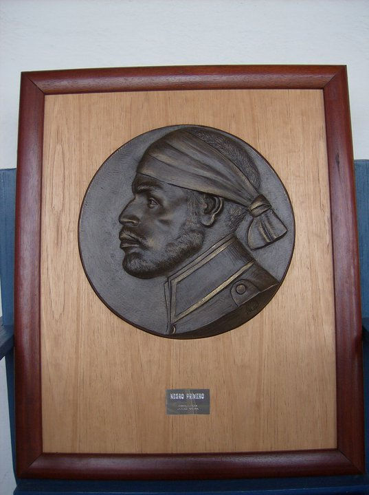 negro primero medallon