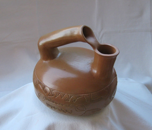 huaco     " asa-pico "