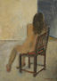 Modelo sentada de espaldas